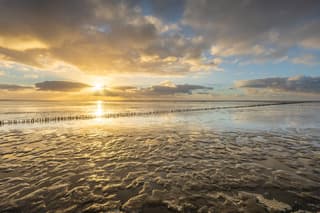 Zonsondergang Waddenzee bij Ternaard 