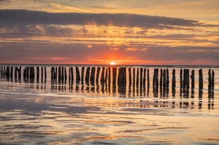 Zonsondergang aan het Wad 