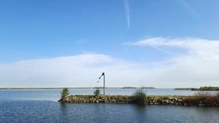 Zon met sluierbewolking 