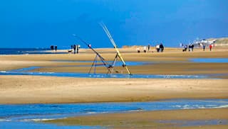 Ondertussen langs het strand 