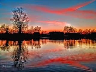 Zonsondergang aan de visvijver 