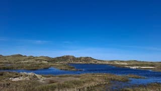 blauw lucht met sluierbewolking Terschelling 