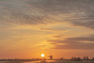 Zonsopkomst met nevel