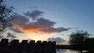 Zonnestralen onder de wolken!
