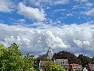 Wolkenlucht boven Willemstad